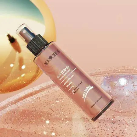 Spray corporel scintillant Golden Shimmer Body Spray Essencelle par Chogan, parfum de monoï et lait, 150 ml.