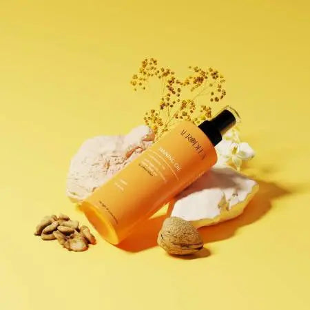 Huile solaire anti-UV Essencelle by Chogan en flacon, protection solaire avec filtre UV, texture légère et hydratante.