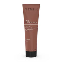 Après-shampoing bio nourrissant Misslath Beauty avec huile d'avocat et d'argan, texture crémeuse dans un flacon.