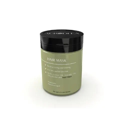 Masque réparateur intense à la bave d’escargot Essencelle by Chogan, texture crème dans un pot blanc.