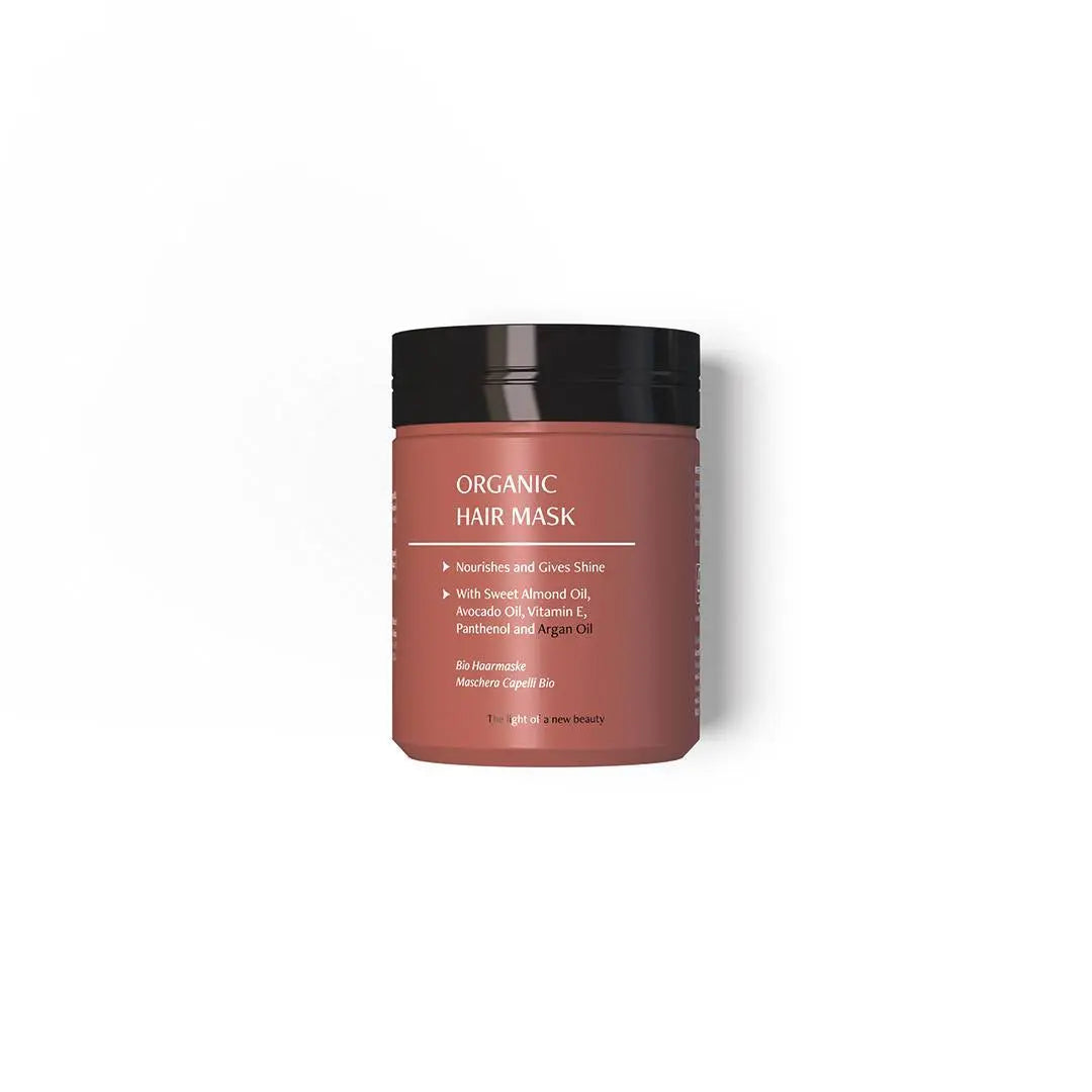 Masque capillaire nourrissant à l’huile d’Argan Essencelle by Chogan, texture crémeuse pour cheveux doux et revitalisés.