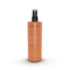 Huile solaire anti-UV Essencelle by Chogan, bouteille avec étiquette, protection solaire, texture huile légère et transparente.